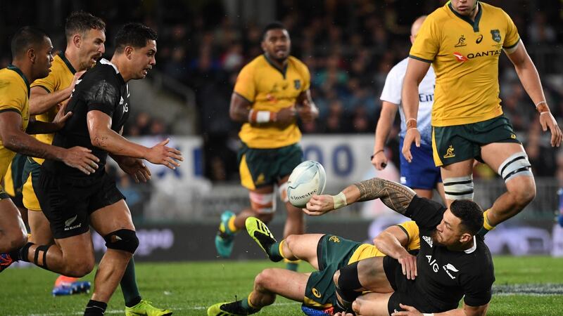 Sonny Bill Williams offloads to Anton Lienert-Brown during the All Blacks win over Australia. Photograph: David Rowland/EPA