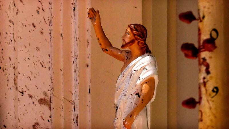 Blood stains on the wall and Jesus Christ statue at St Sebastian Church in Negombo, north of Colombo in Sri Lanka. More than 200 people were killed in eight blasts. Photograph: AP