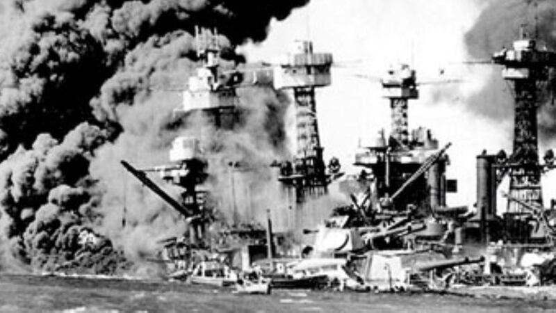 The USS West Virginia burns and sinks after the Japanese attack on Pearl Harbor, December 7th, 1941. Photograph: Reuters