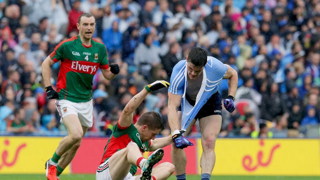 Dublin’s Diarmuid Connolly with Lee Keegan of Mayo during the All-Ireland Senior Football Championship final at Croke Park. Photo: Morgan Treacy/Inpho