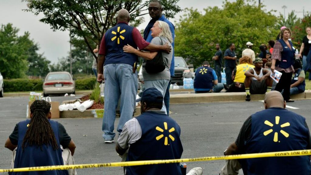 Walmart employees gather in a nearby parking lot after a shooting at the store, on July 30th, in Southaven, Mississippi, US. Photograph: Brandon Dill/AP