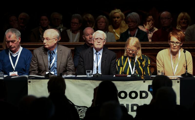 John Kelly (centre) chairs the Bloody Sunday families press conference in the Guildhall in Derry on Thursday following the announcement that a former British soldier will be charged with murder over the killings in 1972. Mr Kelly’s brother, Michael, was killed on Bloody Sunday. Photograph: Paul Faith/AFP/Getty