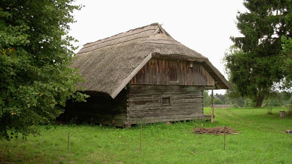 Old wooden structure in Rumsiskes, Lithuania – fascinating log constructions exist deep in Lithuanian forests.