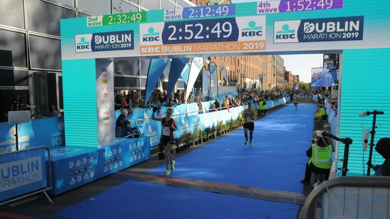 Jan Corcoran crossing the finish line at the Dublin Marathon last year.
