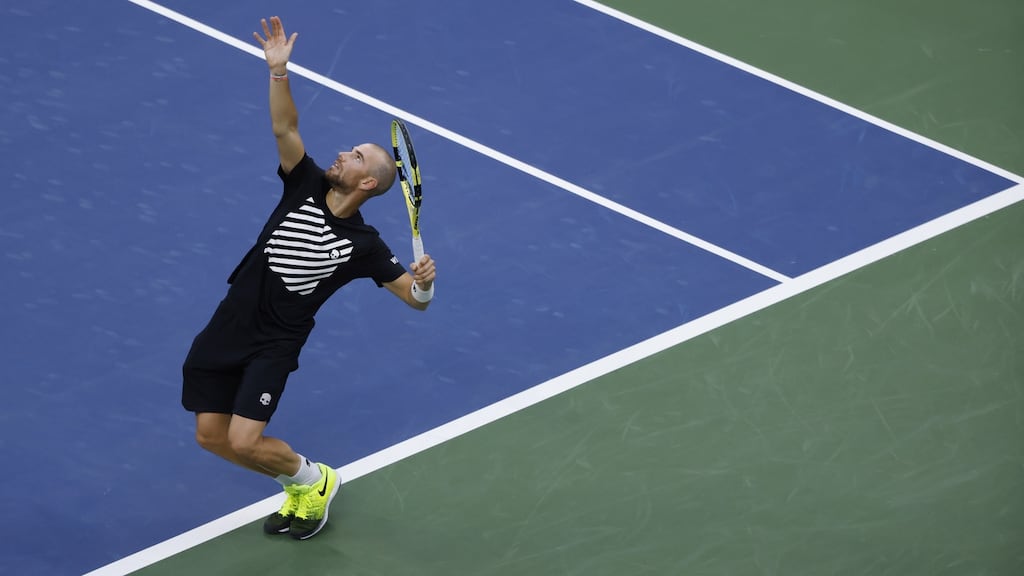Adrian Mannarino serves to Alexander Zverev during their match on the fifth day of the US Open. Photograph: EPA