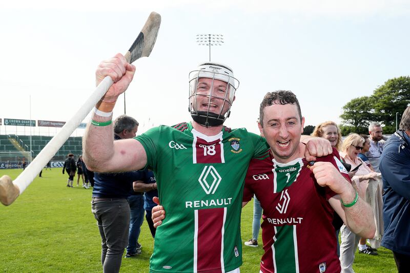 Westmeath goalkeeper Noel Conaty celebrates after the game with Derek McNicholas. Photograph: Laszlo Geczo/Inpho