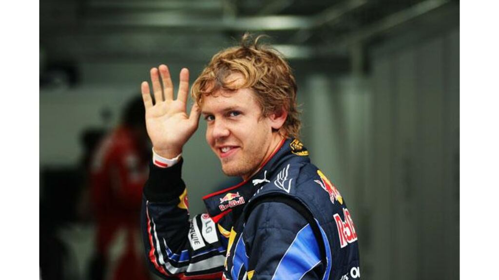Germany's Sebastian Vettel (Red Bull Racing) celebrates in parc ferme after finishing on pole for the Korean Grand Prix at the Korea International Circuit in Yeongam-gun, South Korea. (Photograph: Mark Thompson/Getty)