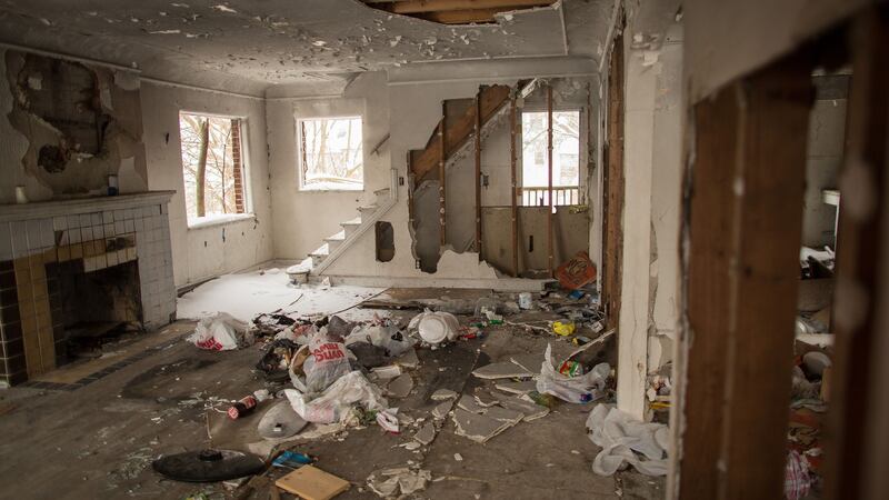 An abandoned home in one of the poorer neighbourhoods of Flint. Car industry layoffs in the 1980s sent Flint into an economic downturn. Photograph: Geoff Robins/AFP/Getty