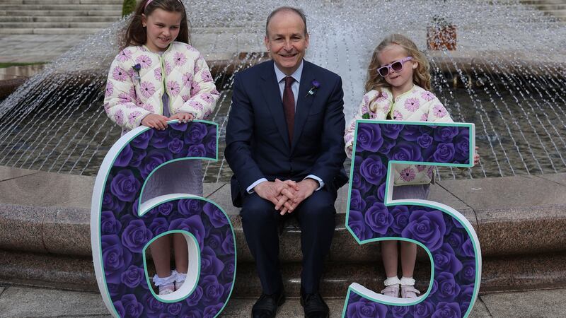 An Taoiseach with sisters Anna (9) and Robyn (7) Kelly at Cystic Fibrosis Ireland 65 Roses launch day. Photograph: Nick Bradshaw