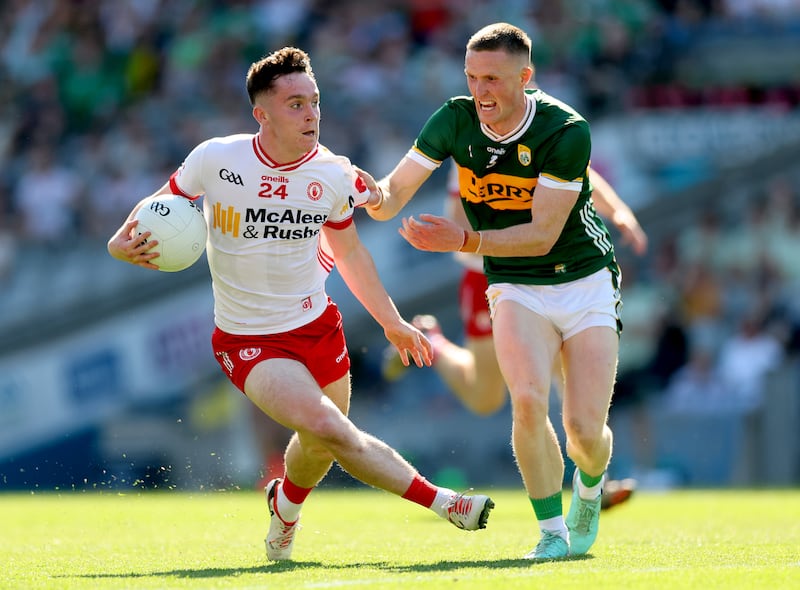 Tyrone’s Eoin McElholm and Kerry's Jason Foley during Saturday's semi-final at Croke Park. Photograph: James Crombie/Inpho