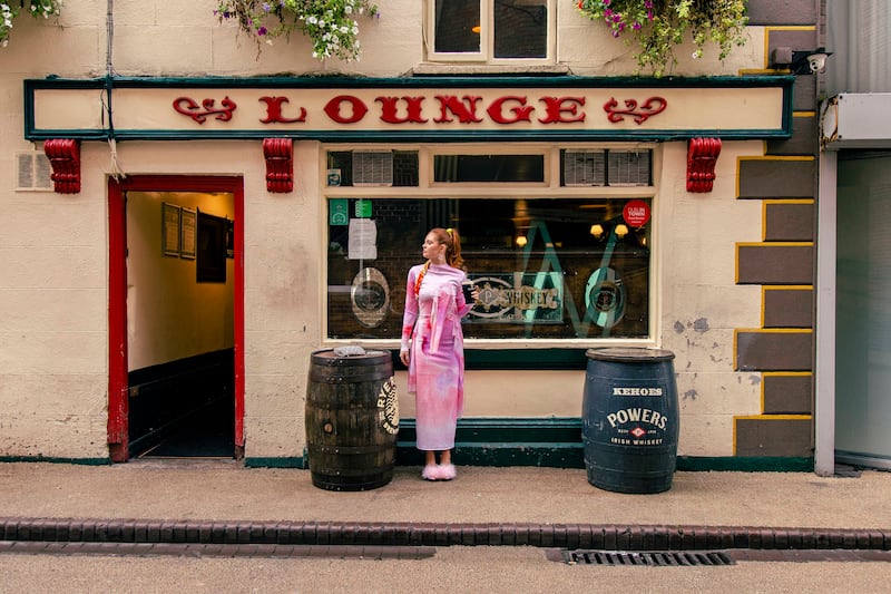 Heavy lycra and power mesh dress €975 designed and printed by Lucy Folan. Iridescent D-Doodle earings €58 by Shock of Grey, printed silk hair ties €35 each by Bourkily Designs, embellished vintage bag €75 by Om Diva. Vintage marabou feather mules €45 by Nobody's Empire. Photograph: Mark Hill