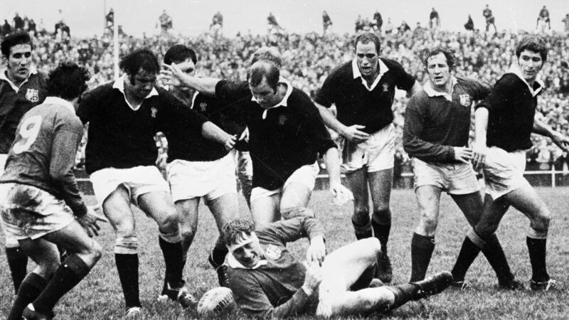 Willie John McBride falls to the ground after being tackled during the first Test in 1971. Photo: Central Press/Getty Images