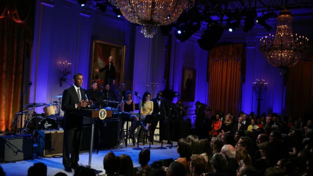 US president Barack Obama hosts a concert of Memphis Soul music as part of the ’In Performance at the White House’ series in the East Room of the White House last night. Photograph: Martin H Simon-Pool/Getty Images