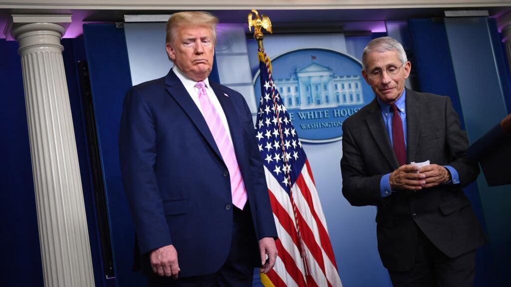 US president Donald Trump and Dr Anthony Fauci, who is leading the country’s response to the pandemic. Photograph: Kevin Dietsch/Pool/EPA
