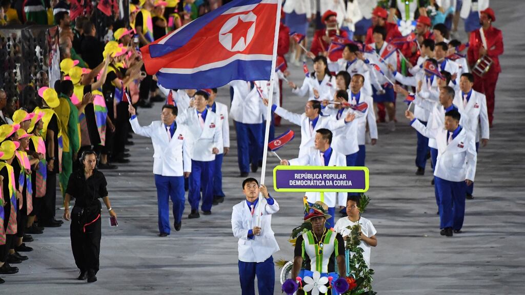 North Korea’s flagbearer Choe Jon Wi leads his delegation during the opening ceremony of the Rio 2016 Olympic Games. Photo: Pedro Ugarte/AFP via Getty Images