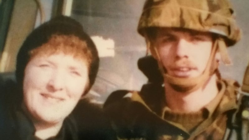 A handout photo courtesy of Tom Caughey, a former member of the Parachute Regiment, of himself and his mother. Mr Caughey is a survivor of a double bomb attack which killed 18 soldiers in Co Down. Photograph: PA
