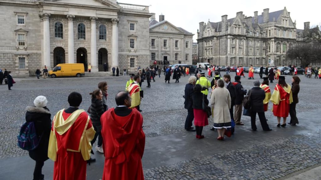 Newly conferred graduates on the front square at Trinity College Dublin. A small increase in third-level applicants is expected to mean there will be little impact on points requirements. Photograph: Frank Miller