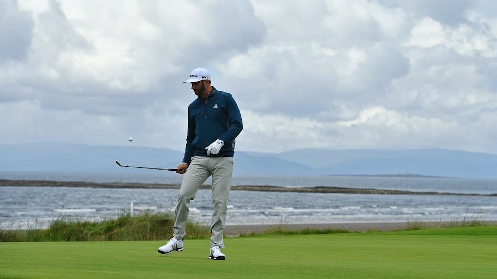 Dustin Johnson taps a ball in the air with his club during a practice round ahead of the British Open at Royal Troon. Photograph: Stuart Franklin/Getty Images