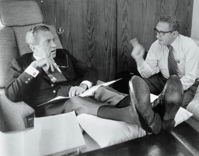 Richard Nixon and Henry Kissinger confer aboard Air Force One in June 1973. Photograph: Bettman Archive/Getty Images