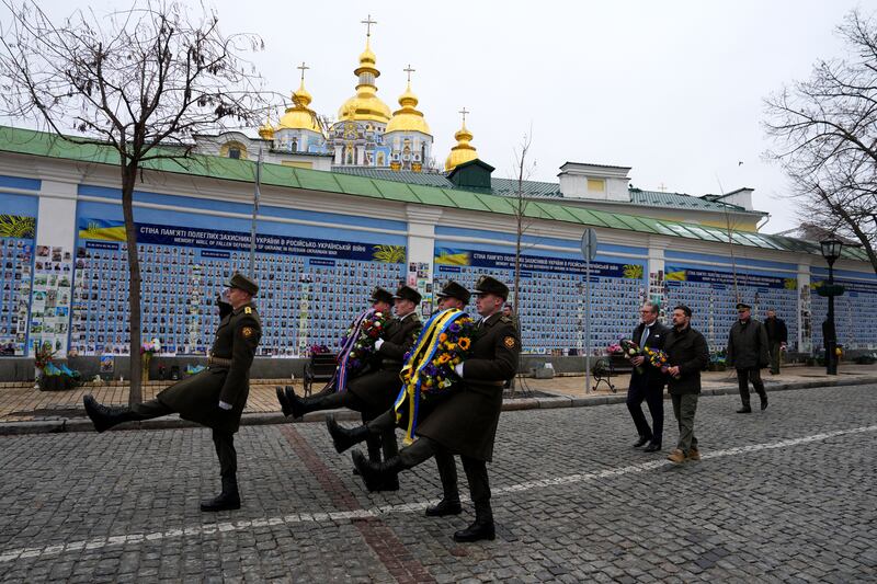 British prime minister Keir Starmer and Ukrainian president Volodymyr Zelenskiy arrive to lay wreaths at the Wall of Remembrance of the Fallen for Ukraine on January 16th in Kyiv, Ukraine. Photograph: Carl Court/Getty Images