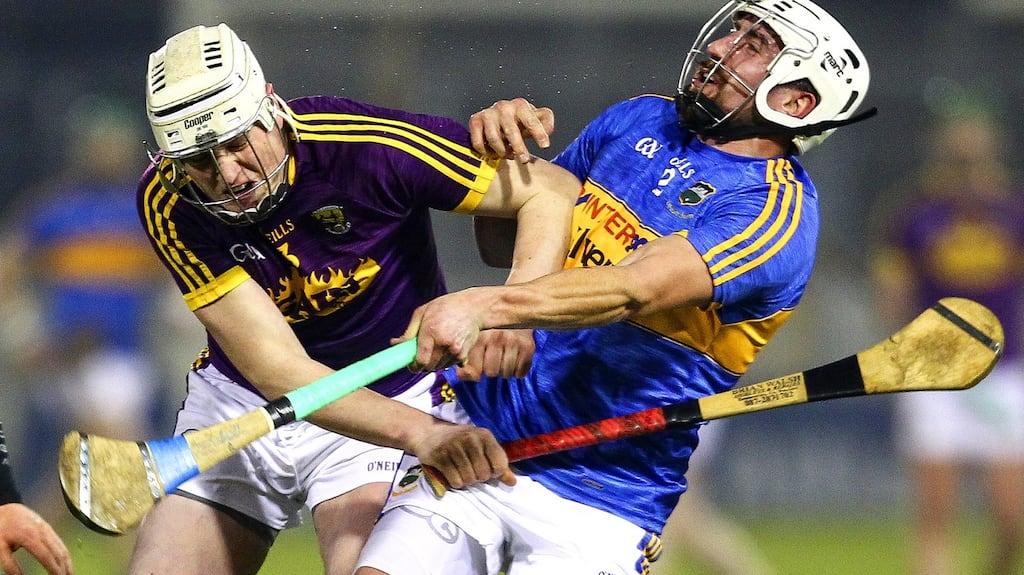 Tipperary’s Patrick Maher is tackled by Wexford’s Liam Ryan during the Allianz Hurling League Division 1A match at  Semple Stadium in Thurles. Photograph: Ken Sutton/Inpho