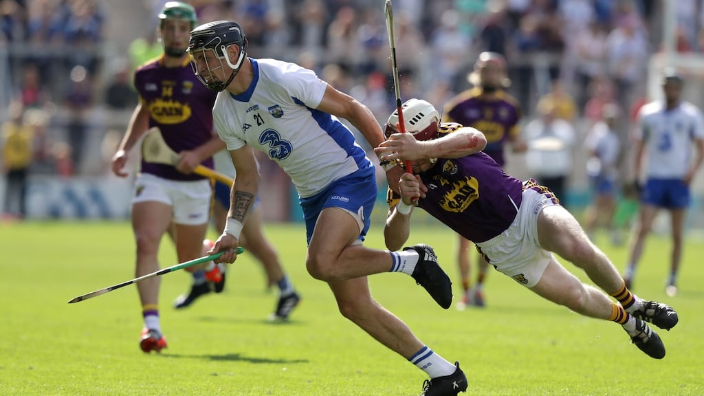 Wexford’s James Breen in action with Maurice Shanahan of Waterford in Páirc Uí Chaoimh. Photograph: Morgan Treacy/Inpho