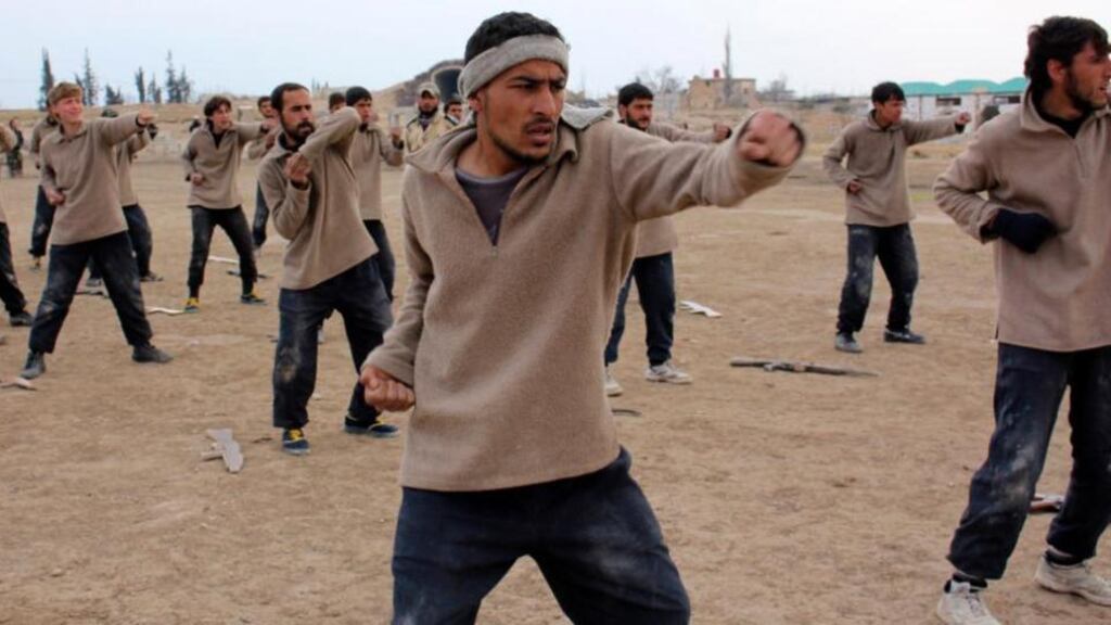 New recruits attend a military training to be part of the Free Syrian Army in eastern al-Ghouta, near Damascus. Photograph: Reuters