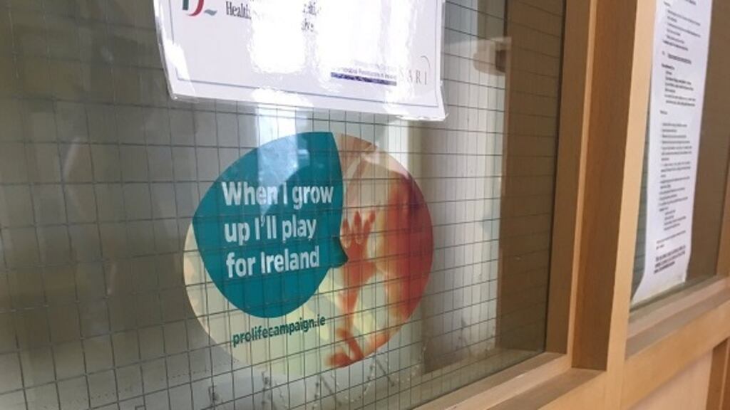 The sticker posted on glass facing a waiting area at Portiuncula hospital in Galway. It has been removed after complaints.