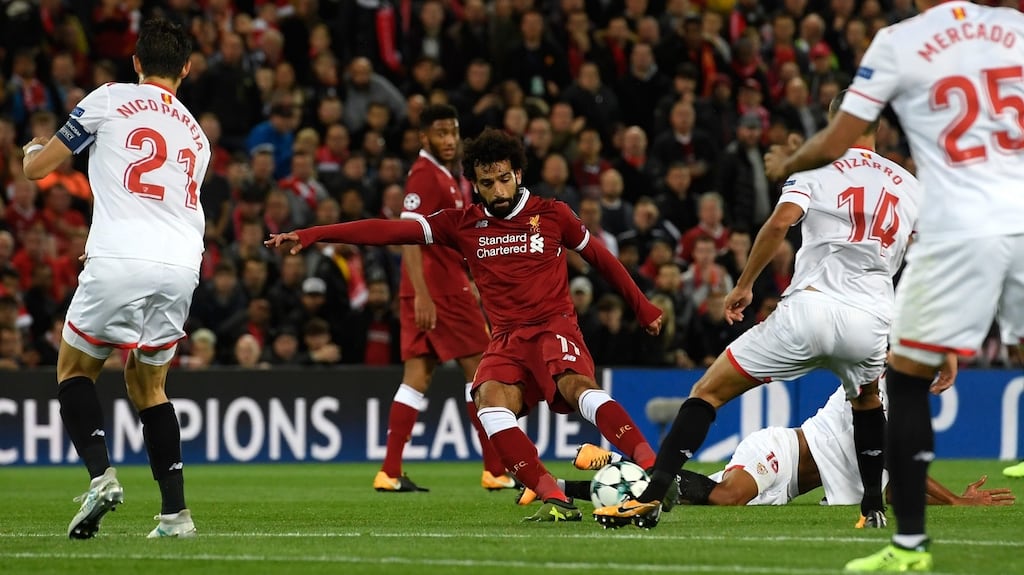 Mohamed Salah scores  Liverpool’s  second goal during the  Champions League  match against Sevilla  at Anfield. Photograph:  Stu Forster/Getty Images