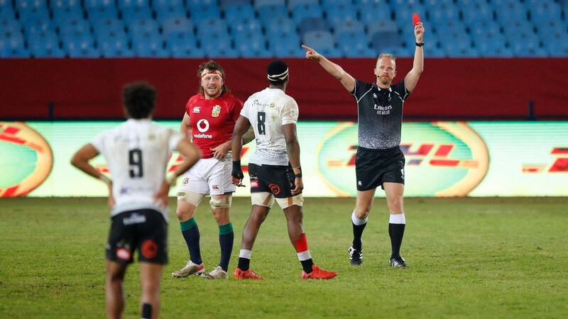Referee Wayne Barnes shows Sharks’ scrumhalf Jaden Hendrikse a red card during the match against the Lions at Loftus Versfeld stadium in Pretoria. Photograph: Phill Magakoe/AFP via Getty Images