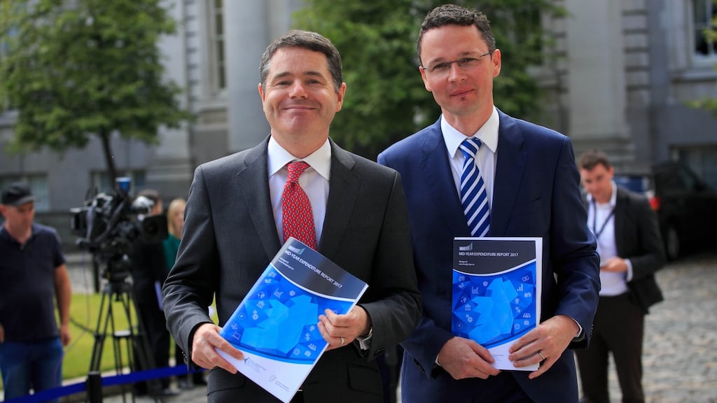 Minister for Finance Paschal Donohoe and Minister of State Patrick O’Donovan at a press briefing on Thursday around a mid-year expenditure report from the Department of Finance. Photograph: Gareth Chaney Collins