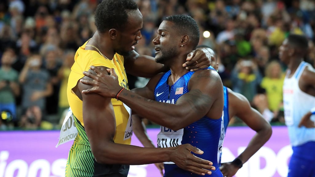 Usain Bolt and Justin Gatlin after the 100 metres final at the World Championships. Photograph: PA