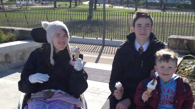 Emily Casey with her brother, Chris, and nephew Dara.