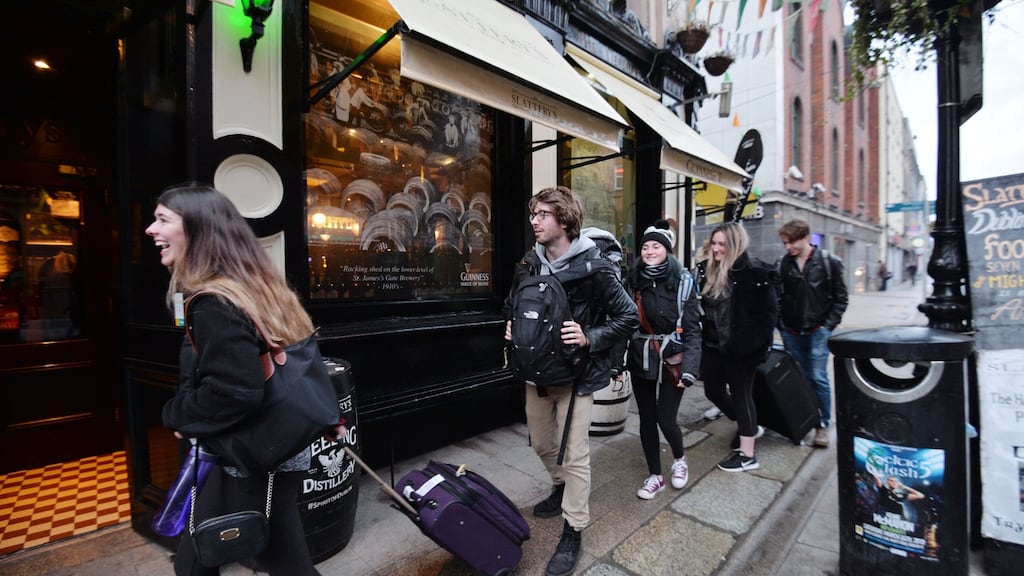 Tourists visiting Slattery’s pub on Capel Street. Photograph: Alan Betson