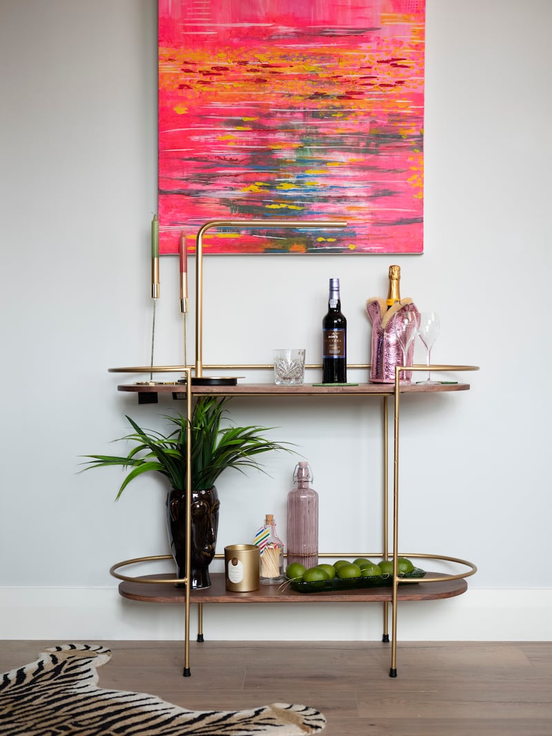 One of Louise’s paintings adorns the walls, painted in Dulux Heritage Romney Wool