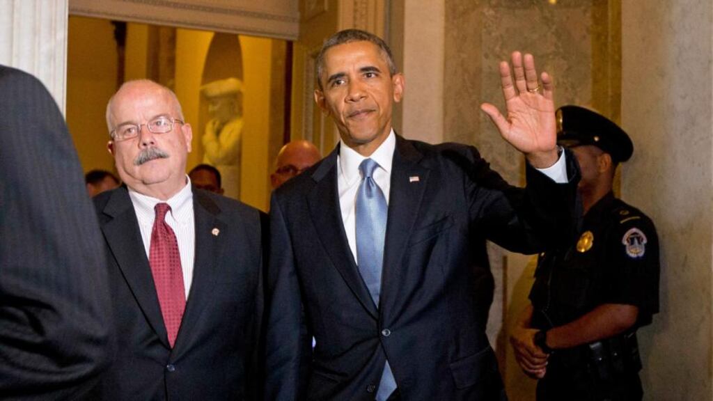 US president Barack Obama walks between meetings on Syria with US Senate Republicans and Democrats, on Capitol Hill in Washington today. Photograph: Jason Reed/Reuters