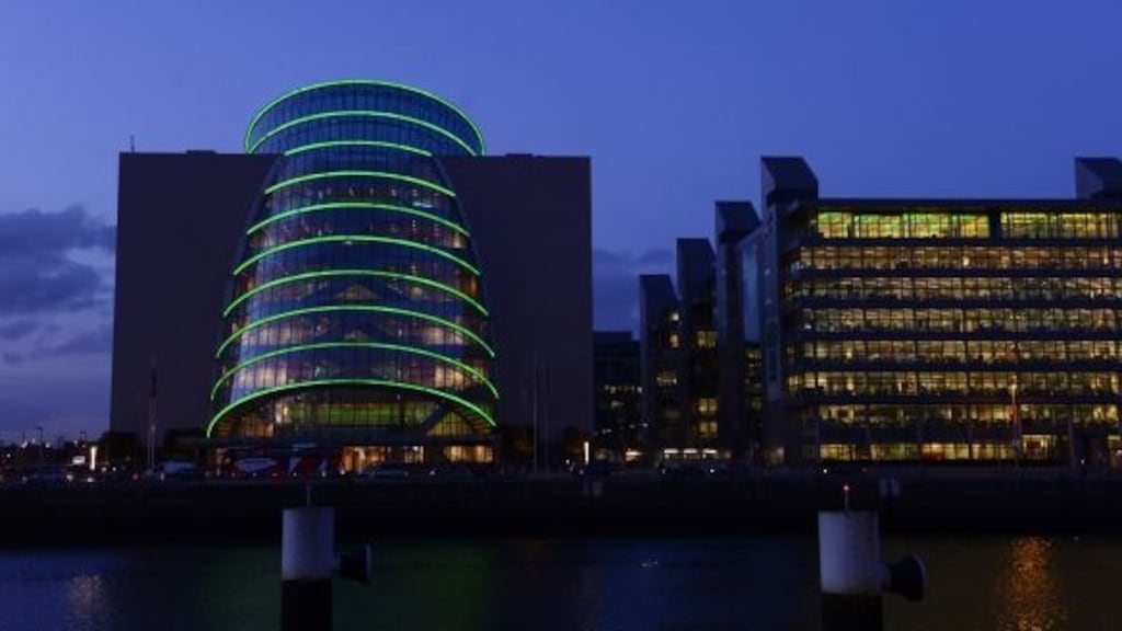 Hundreds of people gathered outside the Convention Centre in Dublin on Wednesday night to protest against the Government’s response to the Covid-19 pandemic. Photograph: Aidan Crawley