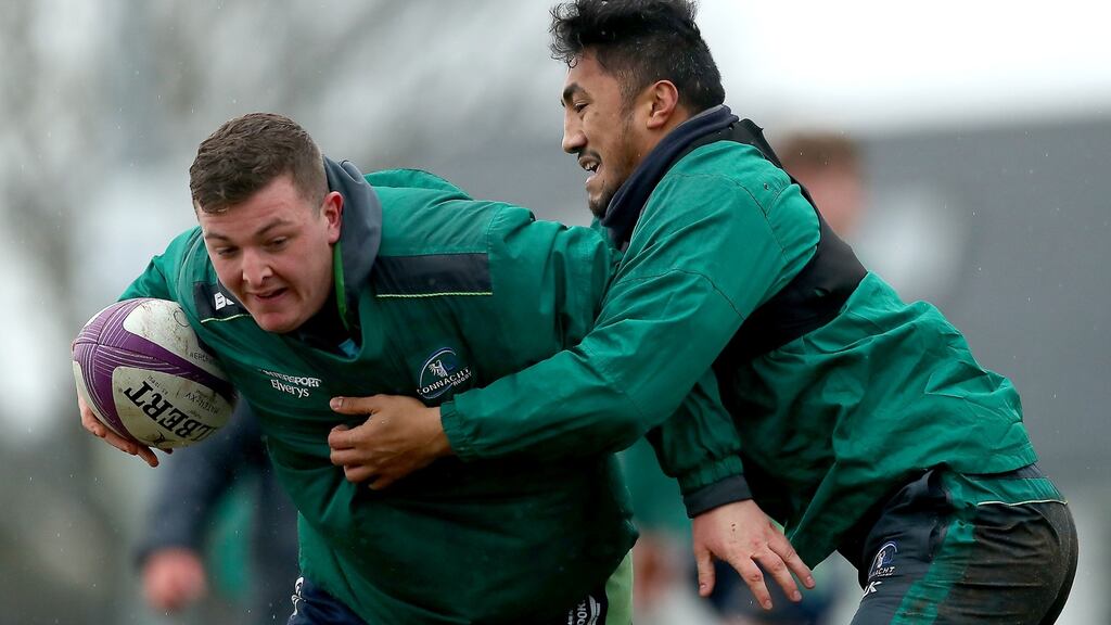 Denis Coulson and Bundee Aki taking part in a Connacht squad session at the Sportsground on Tuesday. Photograph: James Crombie/Inpho