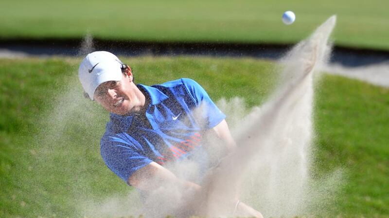 McIlroy hits out of a bunker on the way to his Australia Open success. Photograph: Inpho Rory McIlroy hits out of a bunker on the way to winning the Australian OpenPhotograph: Getty Images