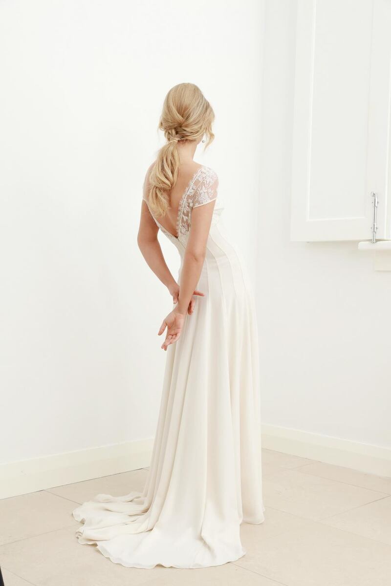 Ivory silk gown with Swarovski encrusted neckline and deep V back detail and puddle train by Louise Kennedy POR