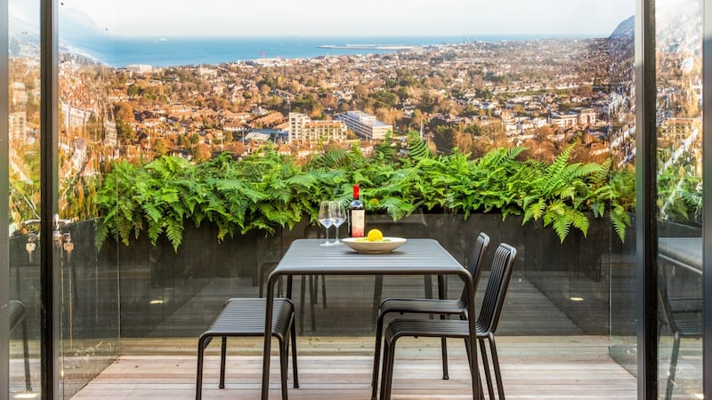 Terrace with city and sea views
