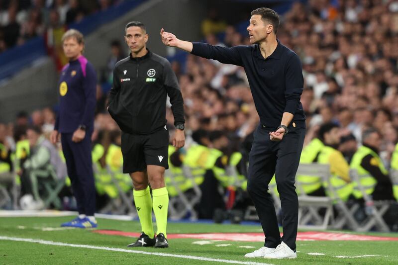 Real Madrid coach Xabi Alonso gestures during the Spanish league football match between Real Madrid and Barcelona at Santiago Bernabeu Stadium in Madrid on Sunday. Photograph: Oscar del Pozo/AFP via Getty Images