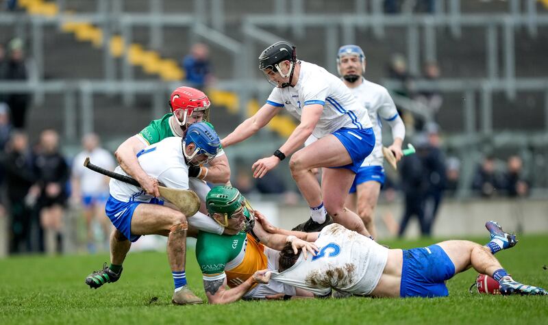 Jack Fagan of Waterford and Leon Fox of Offaly scuffle. Photograph: James Lawlor/Inpho