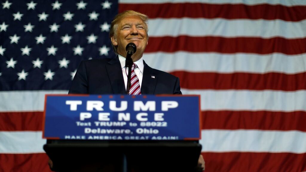 US Republican presidential nominee Donald Trump smiles after making what he said was a major announcement, that he would abide by the election results if he won, to supporters at a campaign rally in Delaware, Ohio. Photograph: Jonathan Ernst/Reuters