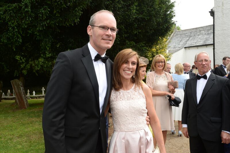 Simon Coveney and his wife, Ruth, at the wedding of Simon Harris and Caoimhe Wade in Kilquade, Co Wicklow. Photograph: Cyril Byrne
