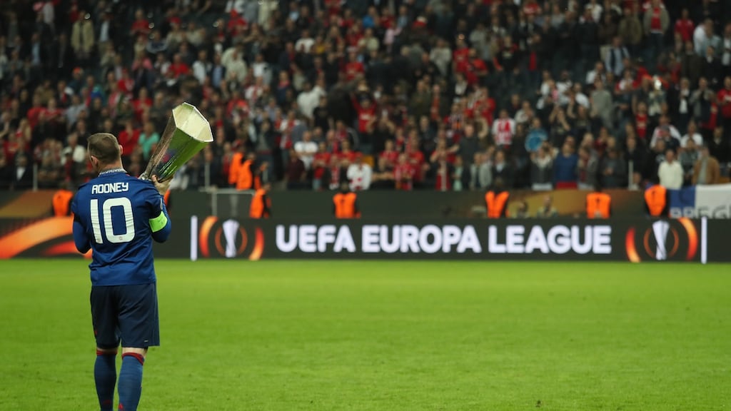Wayne Rooney with the Europa League trophy which completed his set of all major trophies at Manchester United. Photo: Getty Images