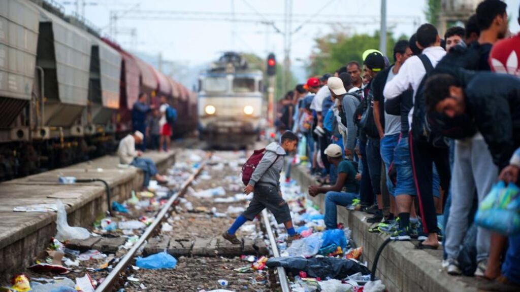 Migrants arrive at a Macedonian railway station in Gevgelija. Photograph: AFP