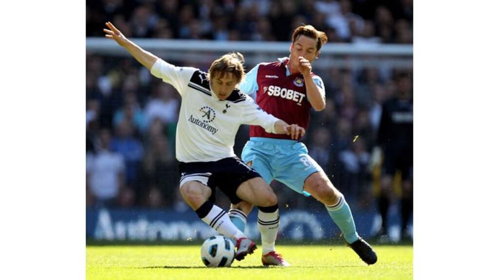 Luka Modric (left) looks to be staying at Tottenham Hotspur and will be joined at White Hart Lane by England midfielder Scott Parker, who completed his move from West Ham today. (Photograph: Ian Walton/Getty Images)