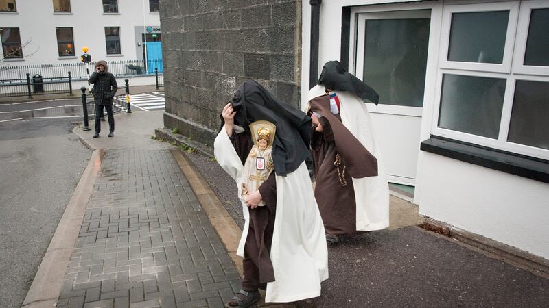 Moster Irene Gibson, carrying a statue of the Child of Prague, and Sr Anne Marie pictured leaving Skibbereen District Court. Photograph: Daragh Mc Sweeney/Cork Courts
