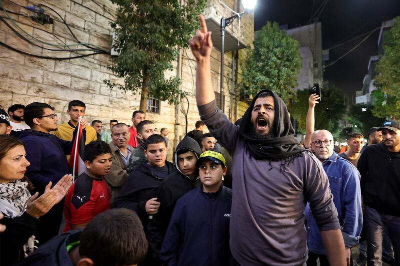 Palestinians chant slogans during a protest on Saturday in the West Bank city of Ramallah, against reported Israeli air strikes on the Jabalia refugee camp in Gaza earlier. Photograph: Zain Jaafar/AFP via Getty Images